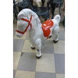 A 1950's Mobo painted metal child's rocking horse