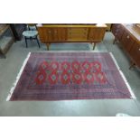 A red ground rug,