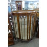 A walnut display cabinet