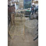 A pair French style wrought iron garden chairs and table