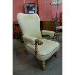 A William IV walnut and upholstered open armchair