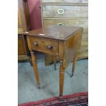 A Victorian mahogany drop-leaf work table