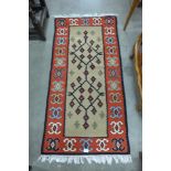 A Turkish Caucasian rug, wool on cotton base,