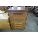 A White & Newton teak chest of drawers