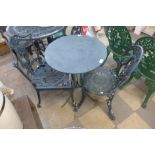 A painted metal bistro table and two aluminium chairs