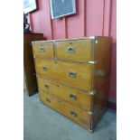 A Victorian teak and brass mounted military campaign chest of drawers