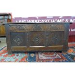 A Charles II carved oak coffer