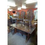 An oak refectory table and six chairs