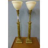 A pair of French style gilt metal table lamps