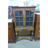 A Victorian walnut cabinet on stand