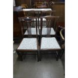 A set of four mahogany dining chairs