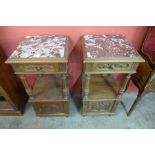 A pair of French walnut and marble topped table de nuits