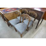 A set of four early Victorian mahogany dining chairs