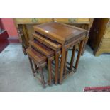 A Chinese carved hardwood nest of quartetto tables