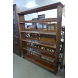 A mahogany open bookcase