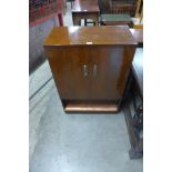 A 1960's mahogany cocktail cabinet