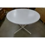 A Kandya circular dining table by Frank Guille