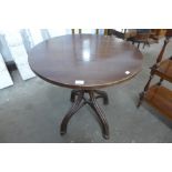 A beech bentwood circular cafe table