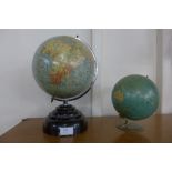 Two small terrestrial globes