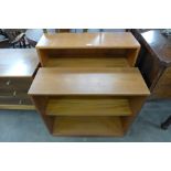 Two teak open bookcases