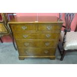 A George III style burr walnut bachelor's chest of drawers