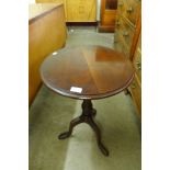 A Chippendale Revival carved mahogany wine table