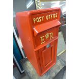 A red Post Office letter box