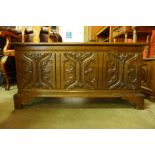 A 17th Century style carved oak coffer