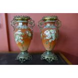 A pair of continental satsuma porcelain and gilt metal mounted two handled vases,