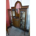 An Edward VII inlaid mahogany display cabinet