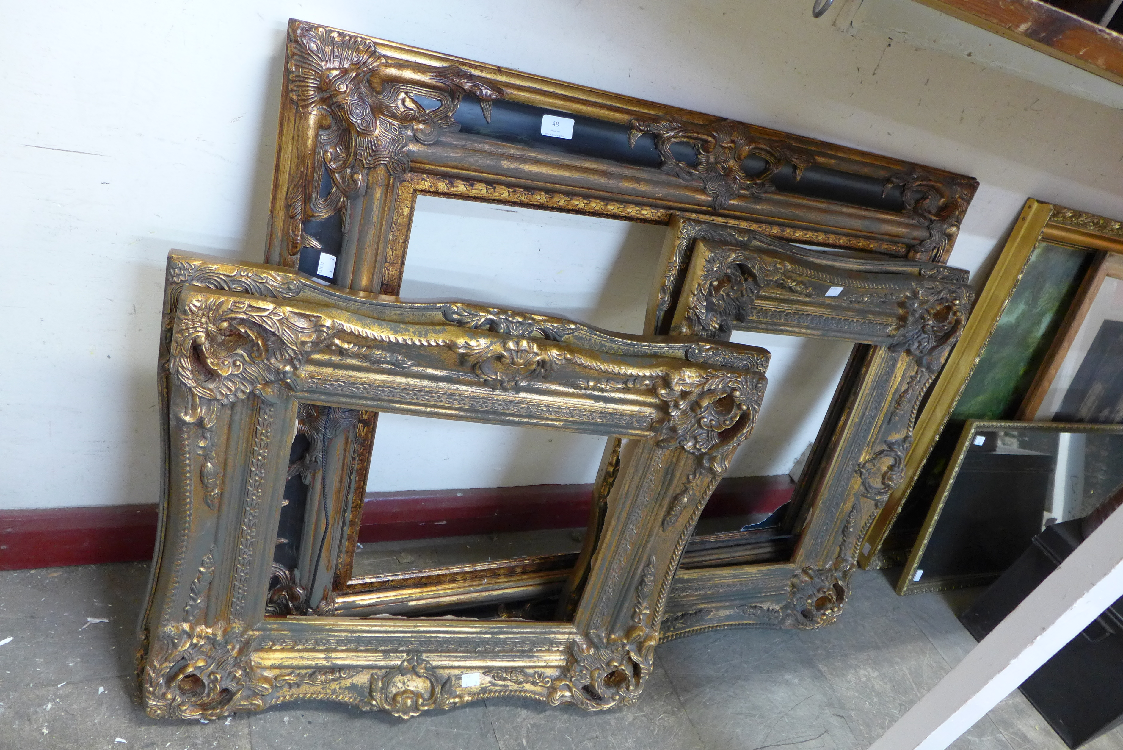 Three gilt picture frames