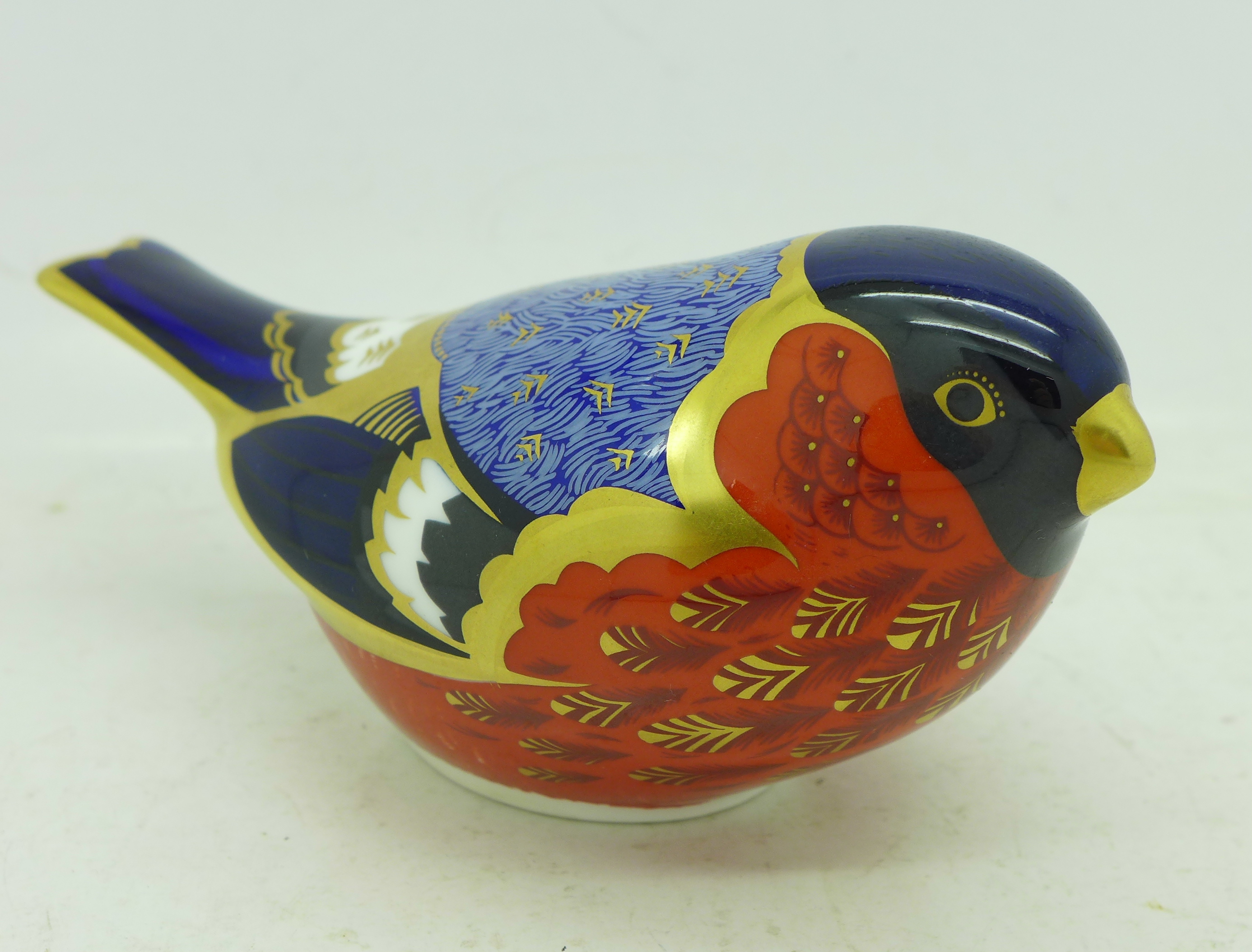 A Royal Crown Derby Bullfinch paperweight with gold stopper