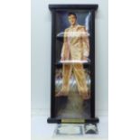 A set of four The Bradford Exchange Elvis Presley full length portrait plates, framed,