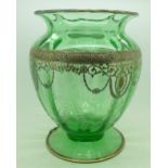 A green cut glass and a silver covered vase, marked sterling, chip to the base,
