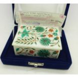 An Indian marble inlaid box, with case and original receipt,