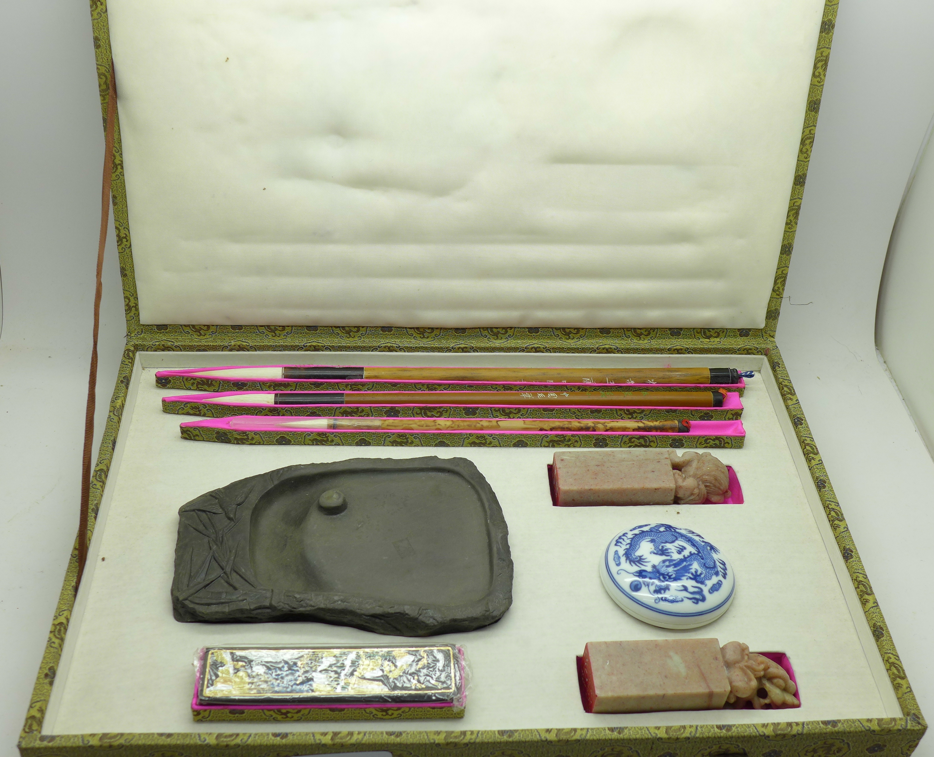 A cased calligraphy set