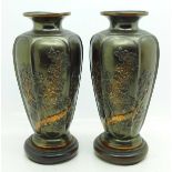 A pair of oriental metal vases on stands, one repaired at base, a/f, 16.