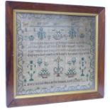 A George IV framed sampler, Mary Read, Hockliffe School, April 2nd 1827,