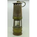 A Hailwoods miner's safety lamp