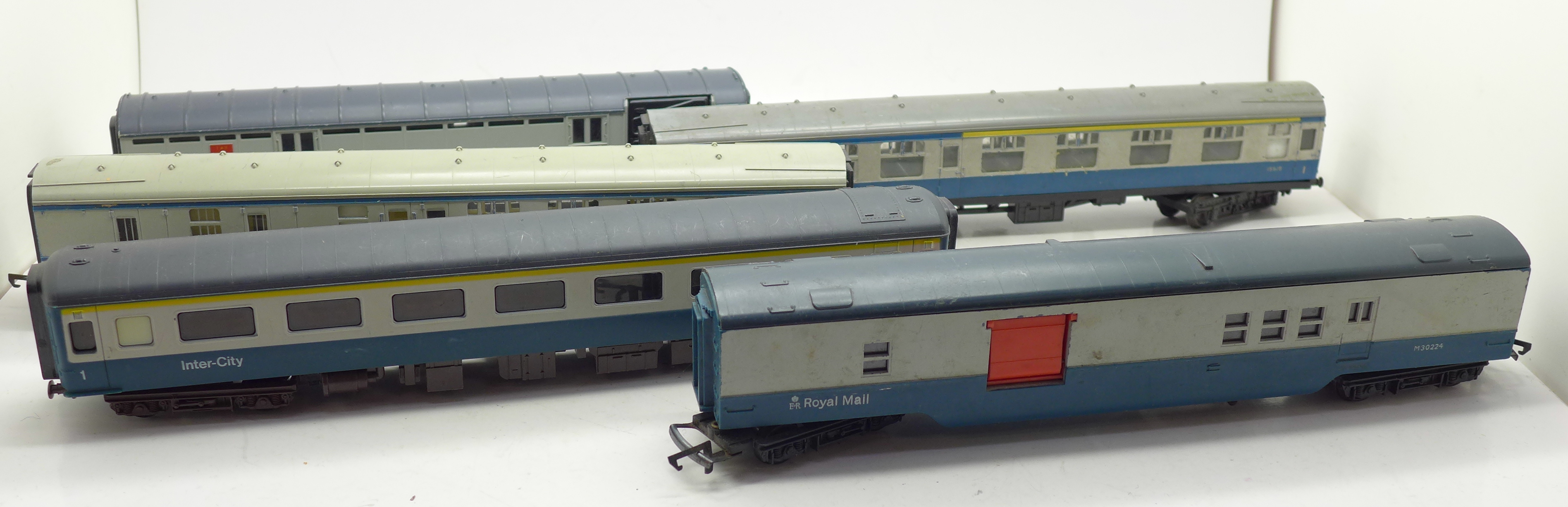 Five model railway carriages