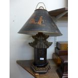 A Chinese lantern style table lamp