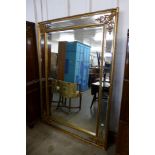 A large French style gilt framed mirror,