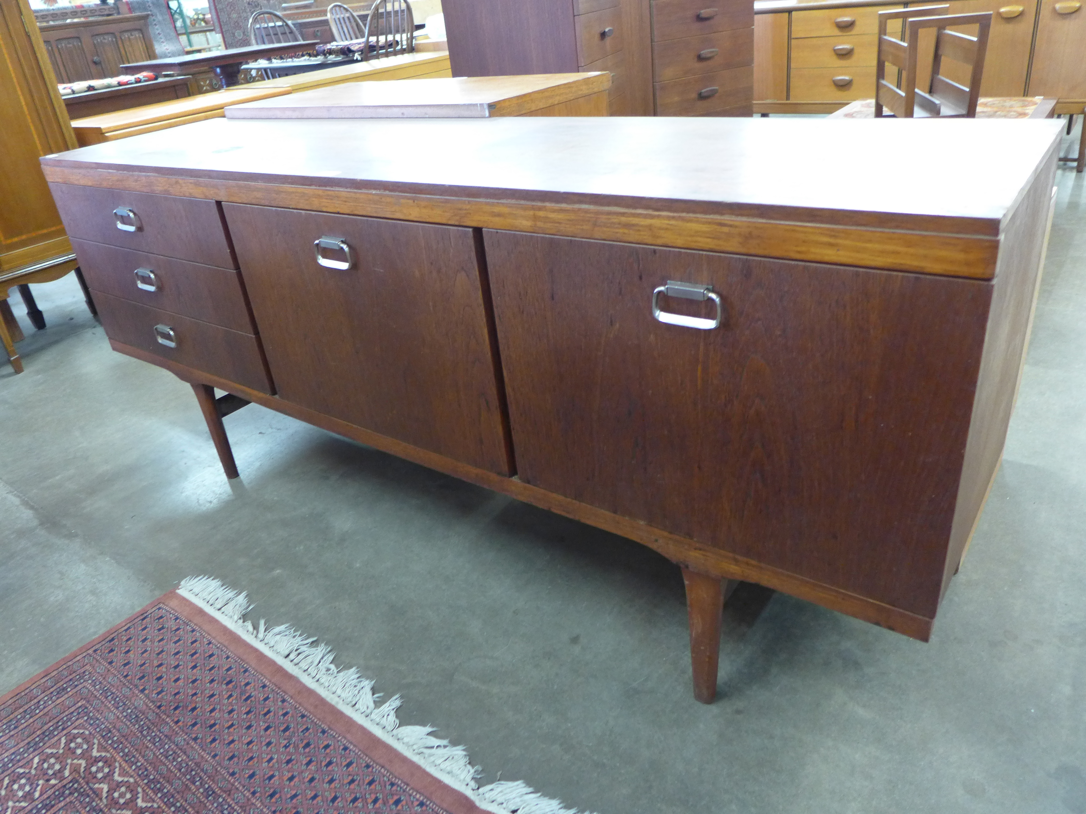 An Elliotts of Newbury teak sideboard