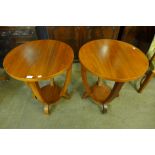 A pair of Art Deco style walnut circular lamp tables