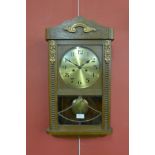 A Gustav Becker oak wall clock
