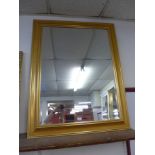 A gilt framed mirror