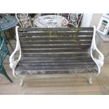 A painted cast alloy metal garden bench