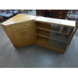 A G-Plan light oak corner cabinet and an oak bookcase