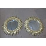 A pair of sunburst mirrors