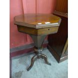 A Victorian rosewood trumpet shaped sewing table